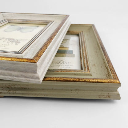 Vintage wooden frames with Franke pictures