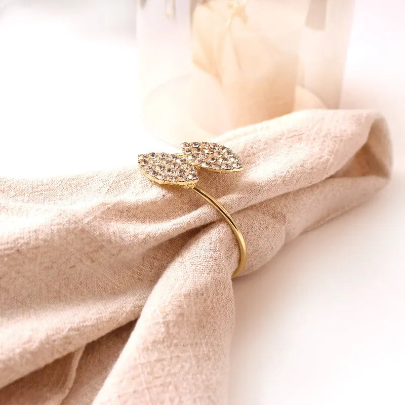 Gold rings for napkins and leaves Celine 4 pcs