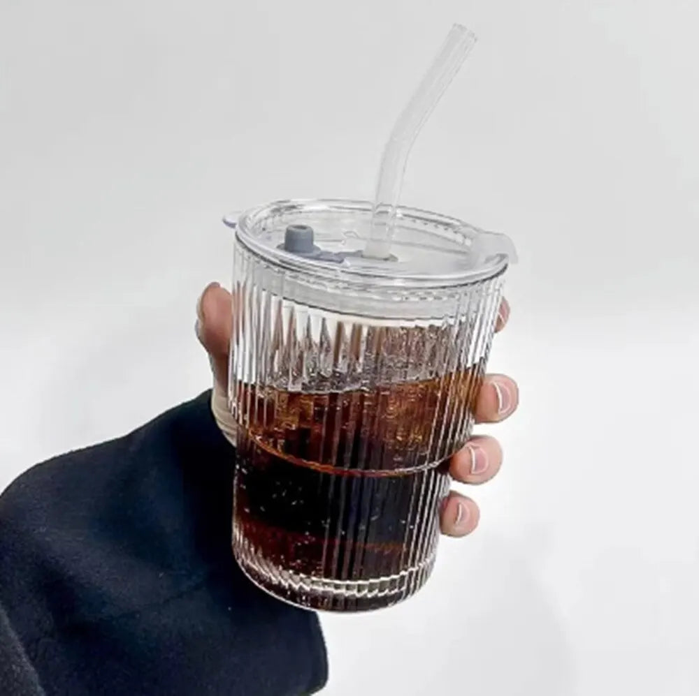 Designer glass in retro style with lid and straw